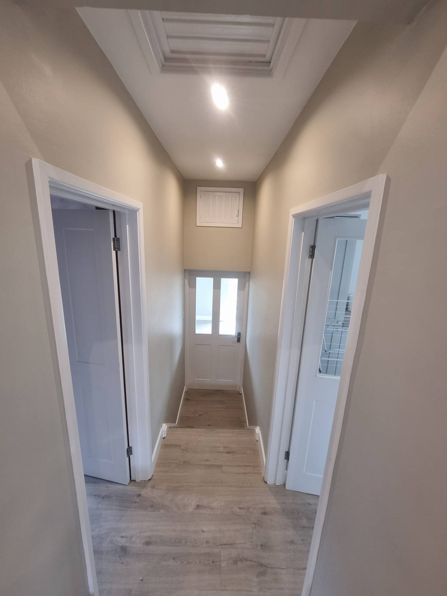 Hallway repaint in a calm modern colour scheme — Newport interior decorating