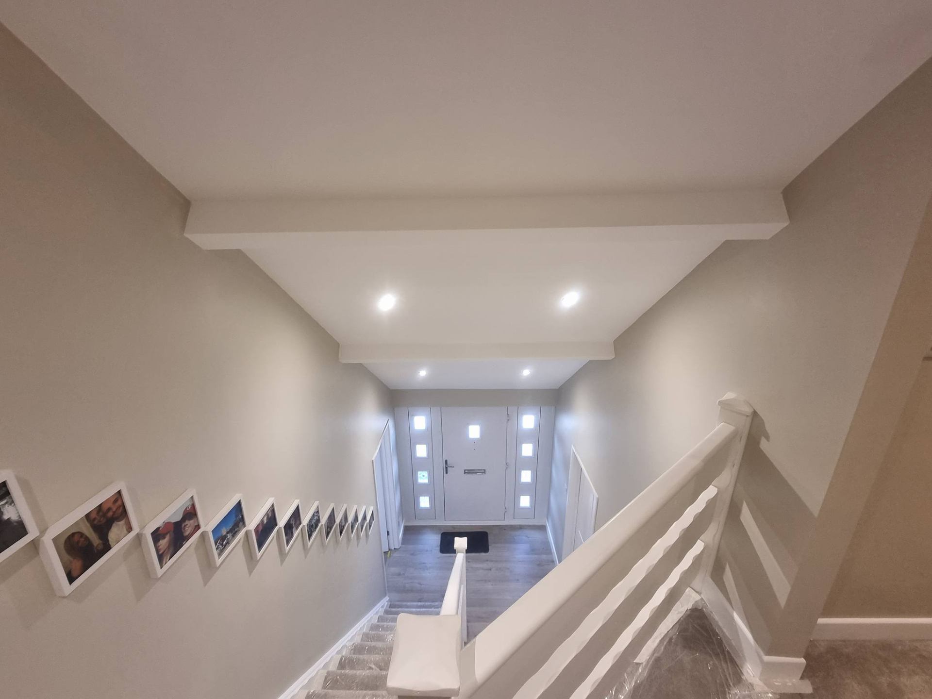 Bright hallway with skylit ceiling — interior decorating in South Wales homes — serving Monmouthshire